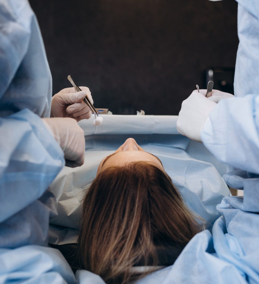 surgeon-and-his-assistant-performing-cosmetic-surg-2023-11-27-05-00-32-utc_Easy-Resize.com